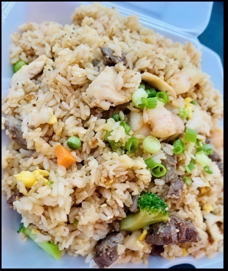 Hibachi fried rice with beef, chicken, egg and green onion